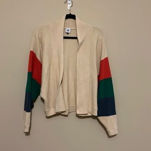 Small tan cabi cardigan with multicolored sleeves.